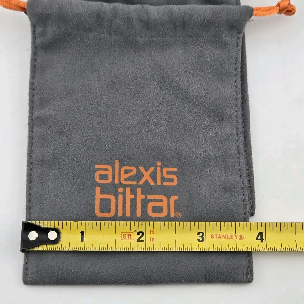 Alexis Bittar cuffs handling specks